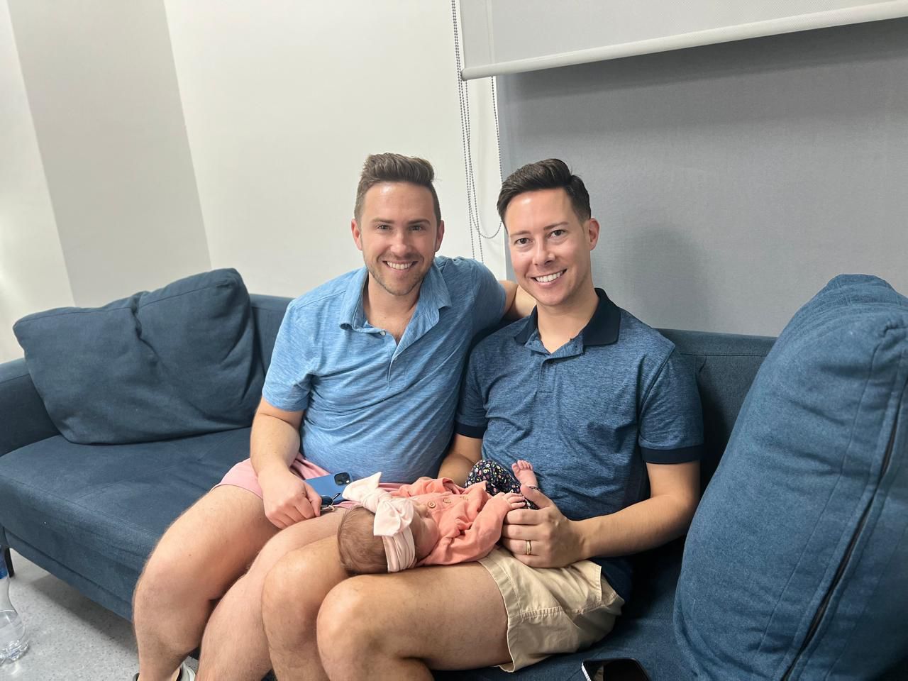 Gay couple with their child