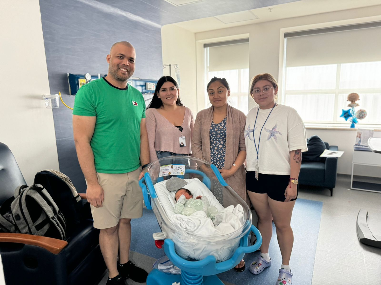 FSC team with a father at the hospital